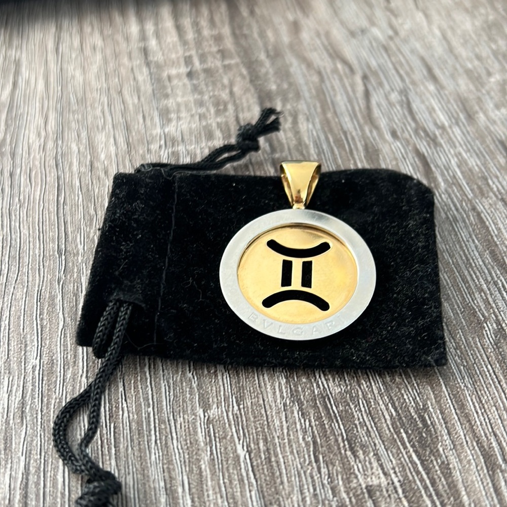 Like new Bulgari gemini pendent.